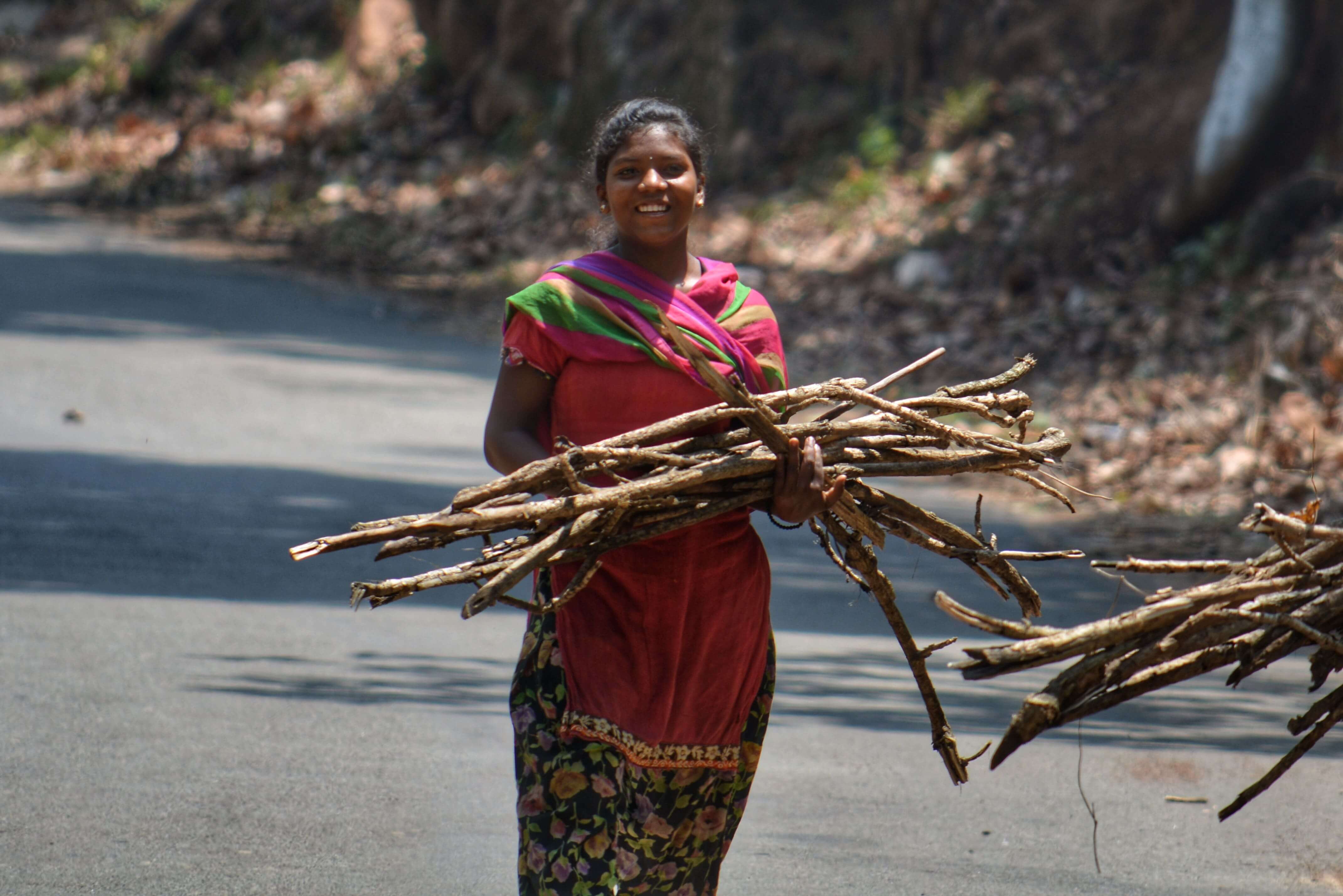 tribal women carrying firewood in araku valley