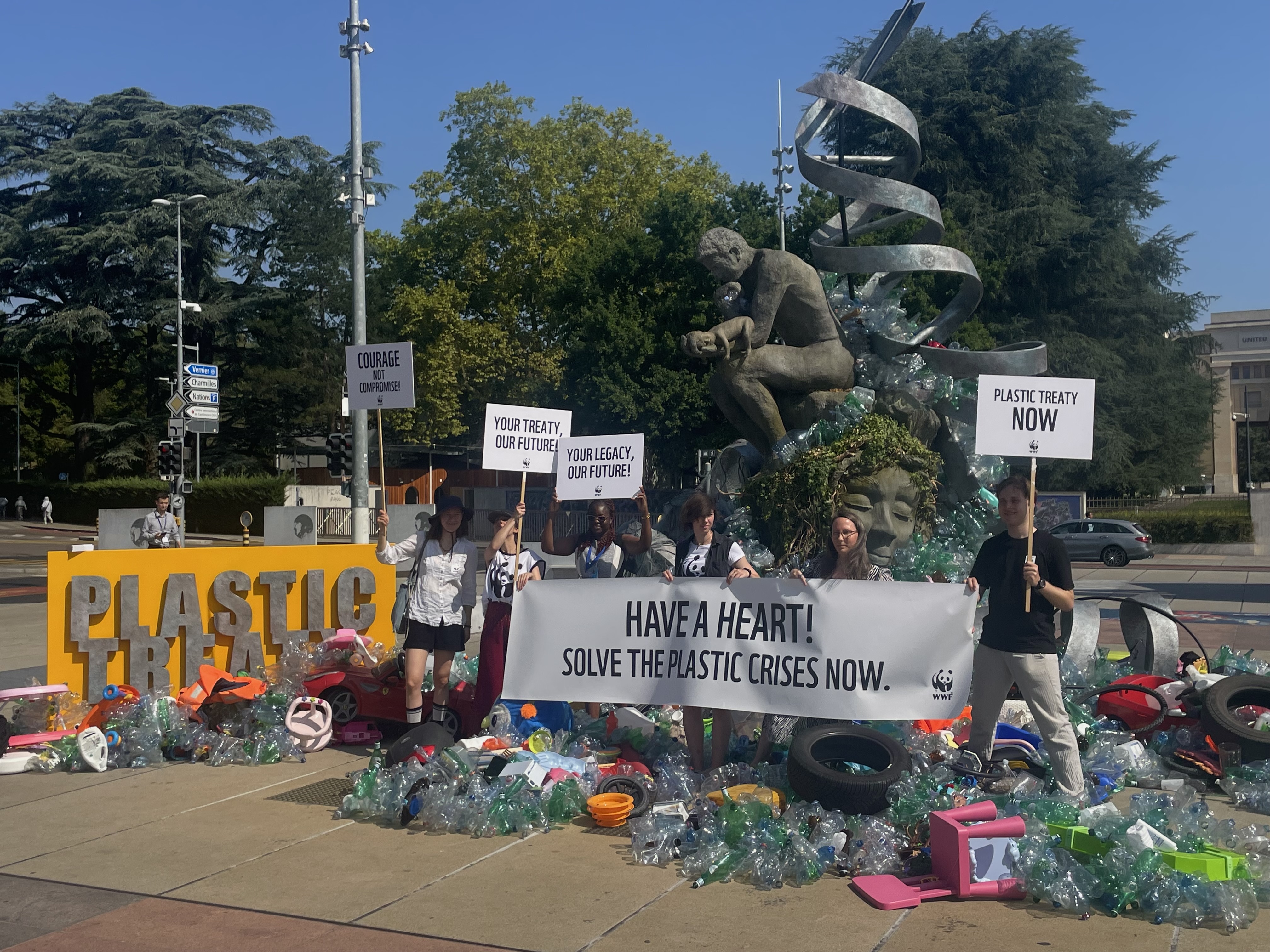 WWF’s Youth Mosaic installation in front of Benjamin von Wong's sculpture, "Thinker's Burden", at the Place des Nations, Geneva, during INC-5.2, August 2025
