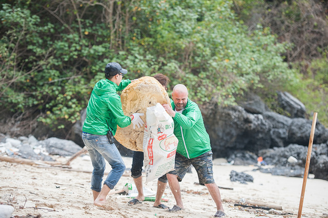 Mr. Darius Postma (right) - CSR Foundation Director of HG Holdings collected a giant foam on the beach 