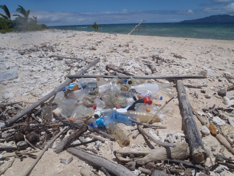 Plastic rubbish lying along a beach in Fiji