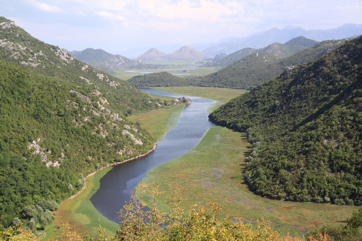 An inlet on Lake Skadar, Albania and Montenegro. This large Mediterranean lake and its associated catchment is a freshwater Key Biodiversity Area (KBA) supporting at least 24 species of threatened or restricted range freshwater species