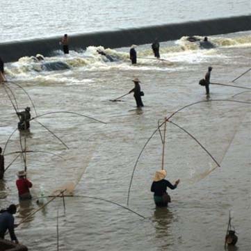 Fishing in floodwaters in Xe Champhone, Lao PDR.