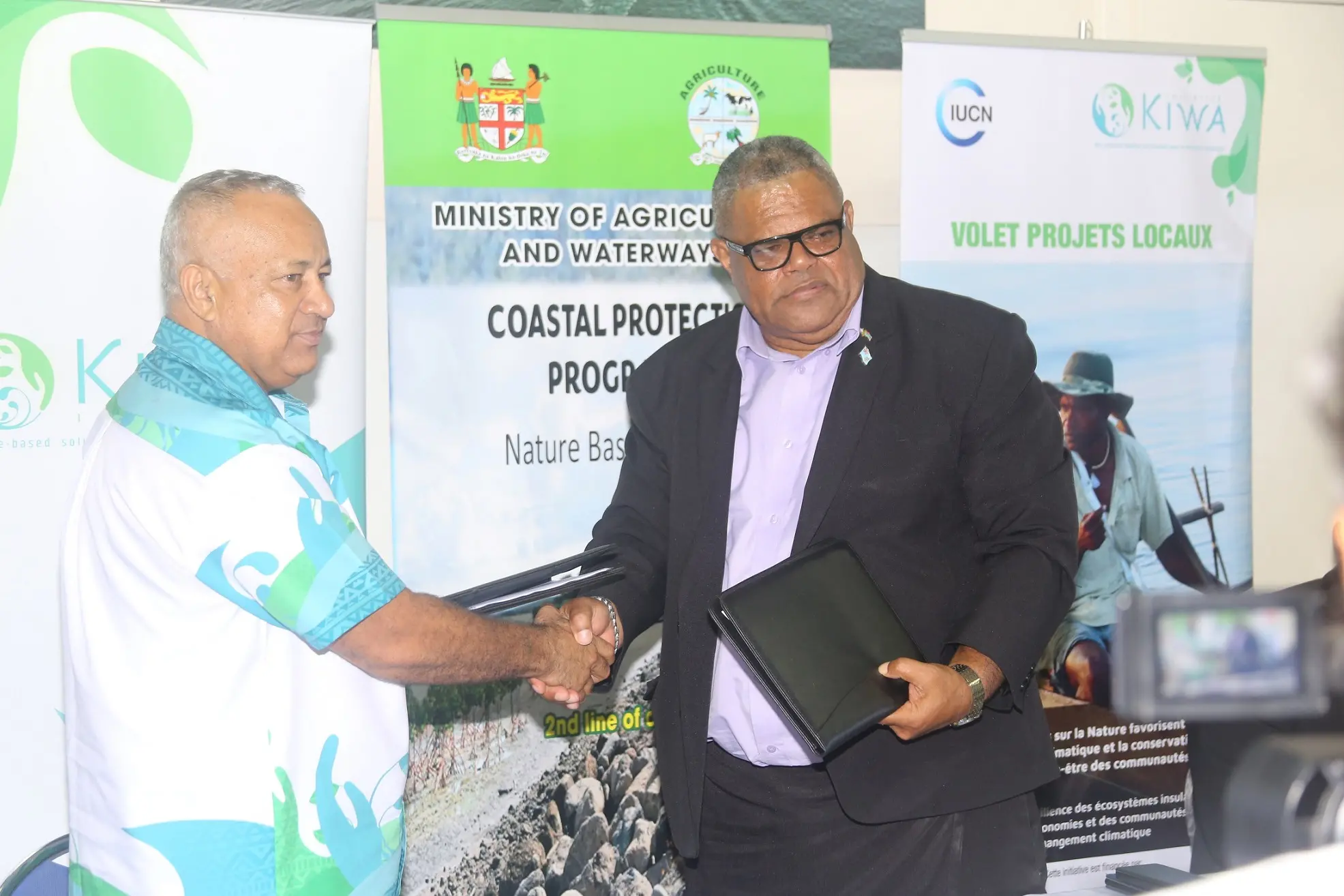 IUCN Regional Director Mason Smith and Fiji Minister of Agriculture and Waterways Hon. Vatimi Rayalu signs Kiwa Initiative agreement
