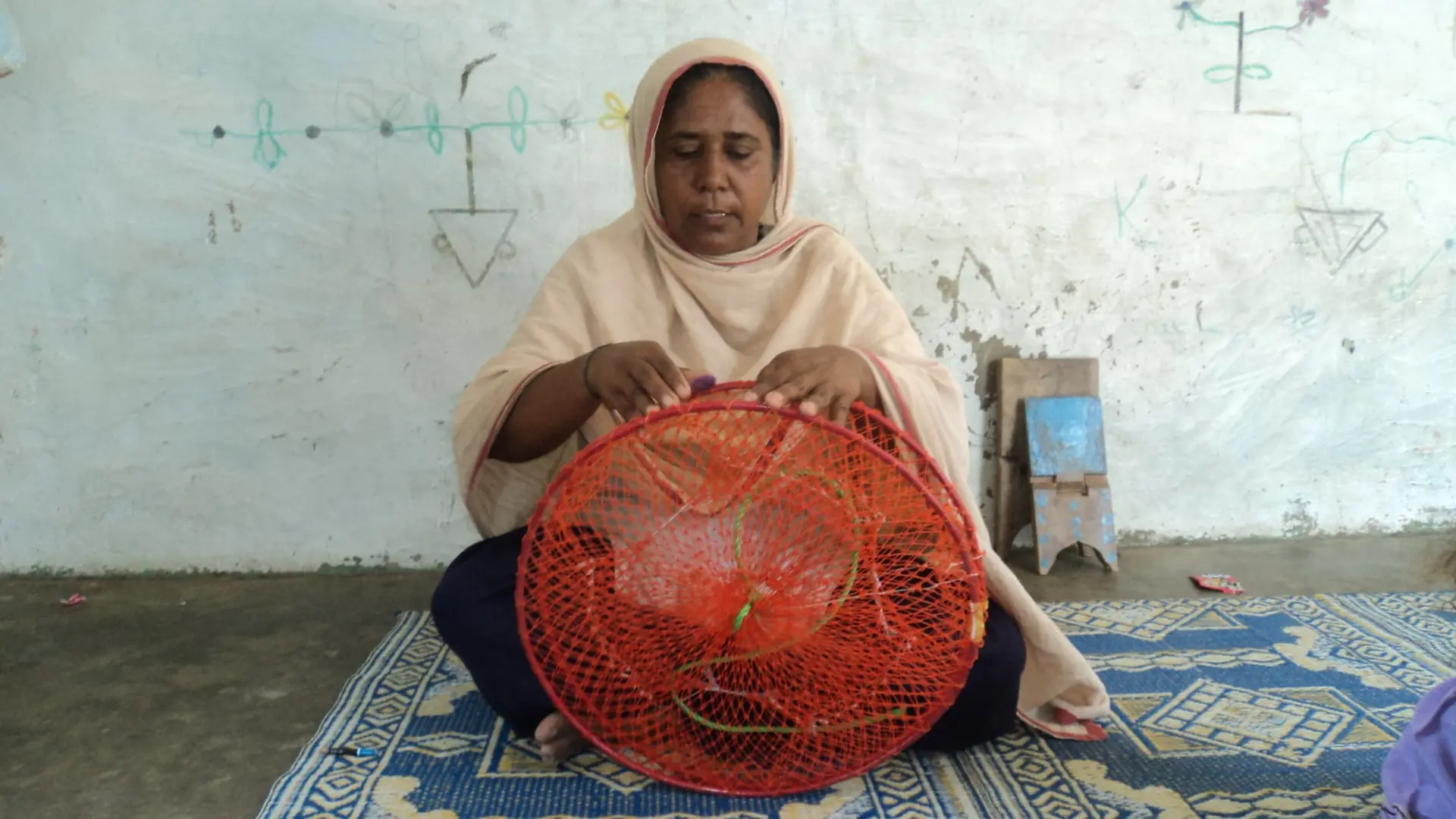 A Woman Making Crab Net, Fishing Community, Ibrahim Hyderi, Karachi Coast, Sindh Pakistan, Trust for Conservation of Coastal Resources by Asif Ahmed.