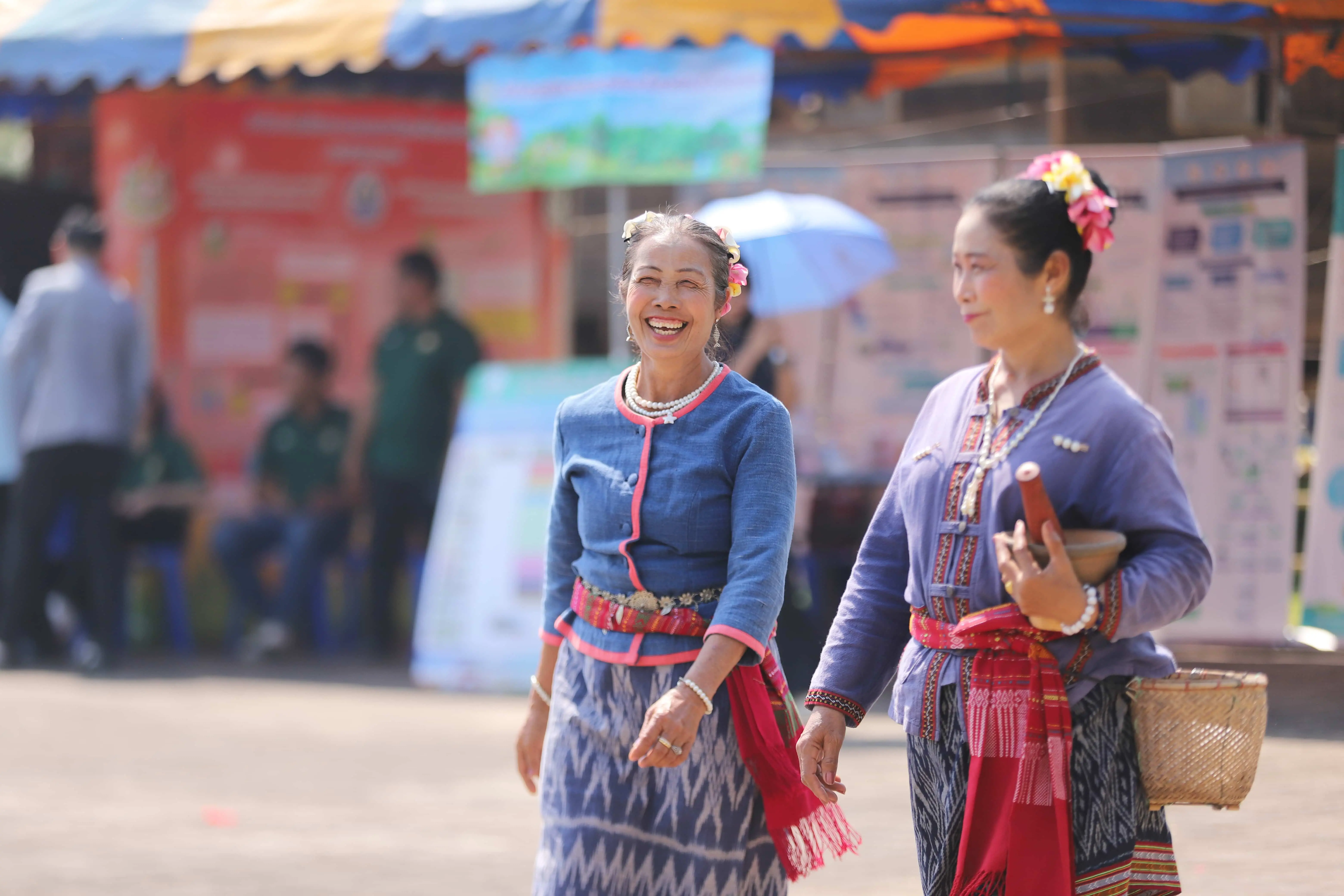Two women walking and smiling