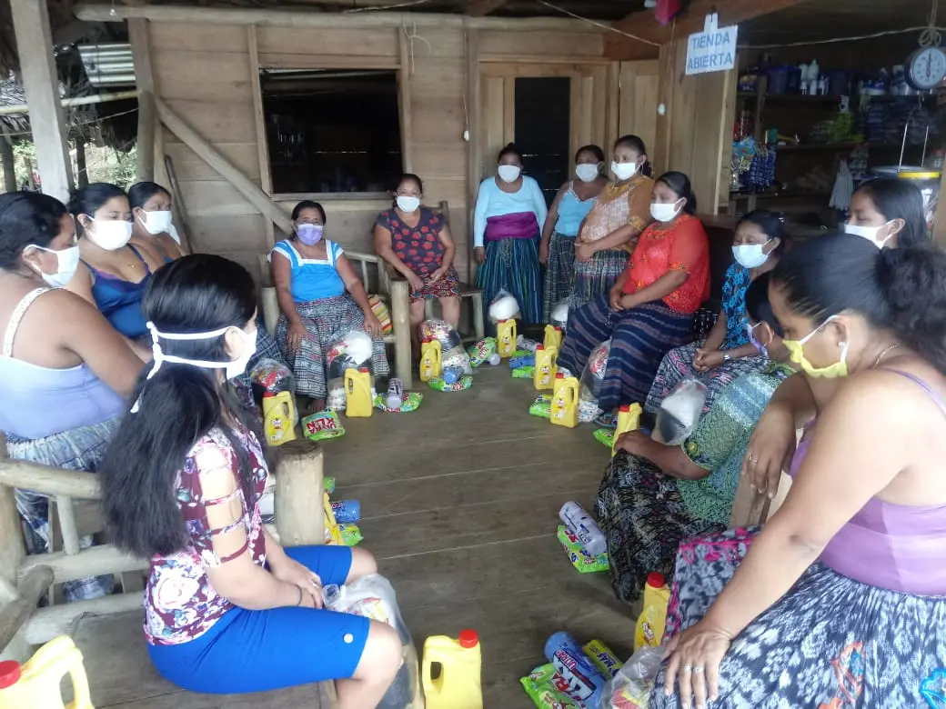 Rural and indigenous women are particularly impacted by the COVID-19 pandemic. Here, Maya Q'eqchi women from Guatemala learn about further sanitation protocols while sharing ancestral knowledge of natural medicines found in their forests and family garden