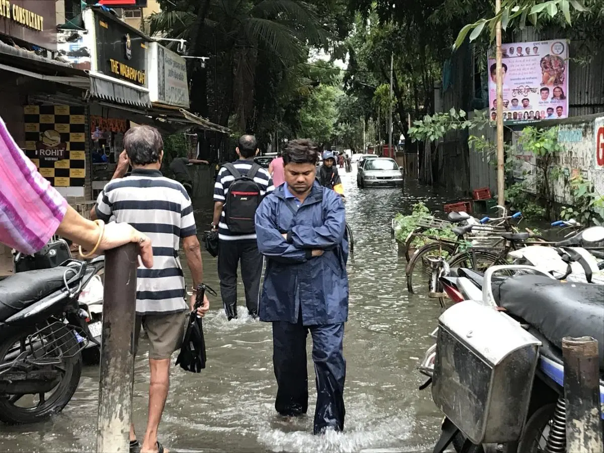 Person Walking on Flood