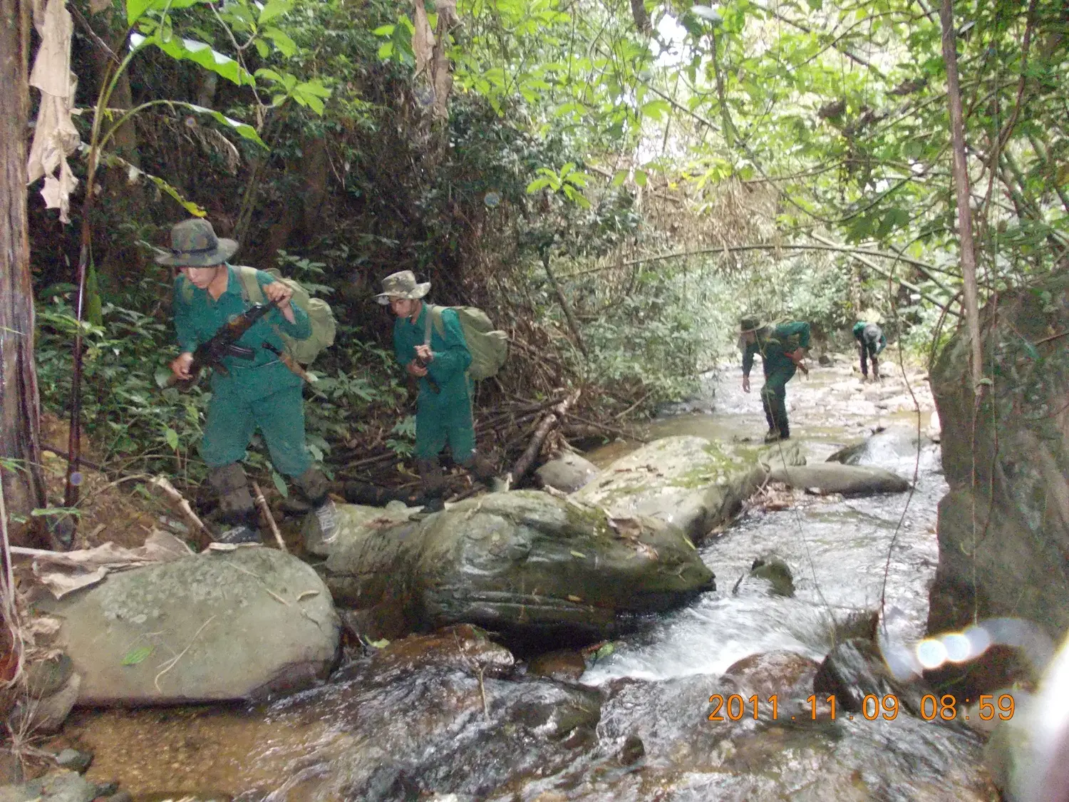 An enforcement team conduct a foot patrol in Phou Sithone ESCA