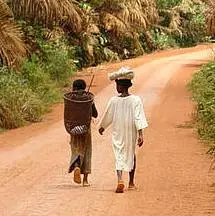 Children walking on the road to Lomié, Cameroon