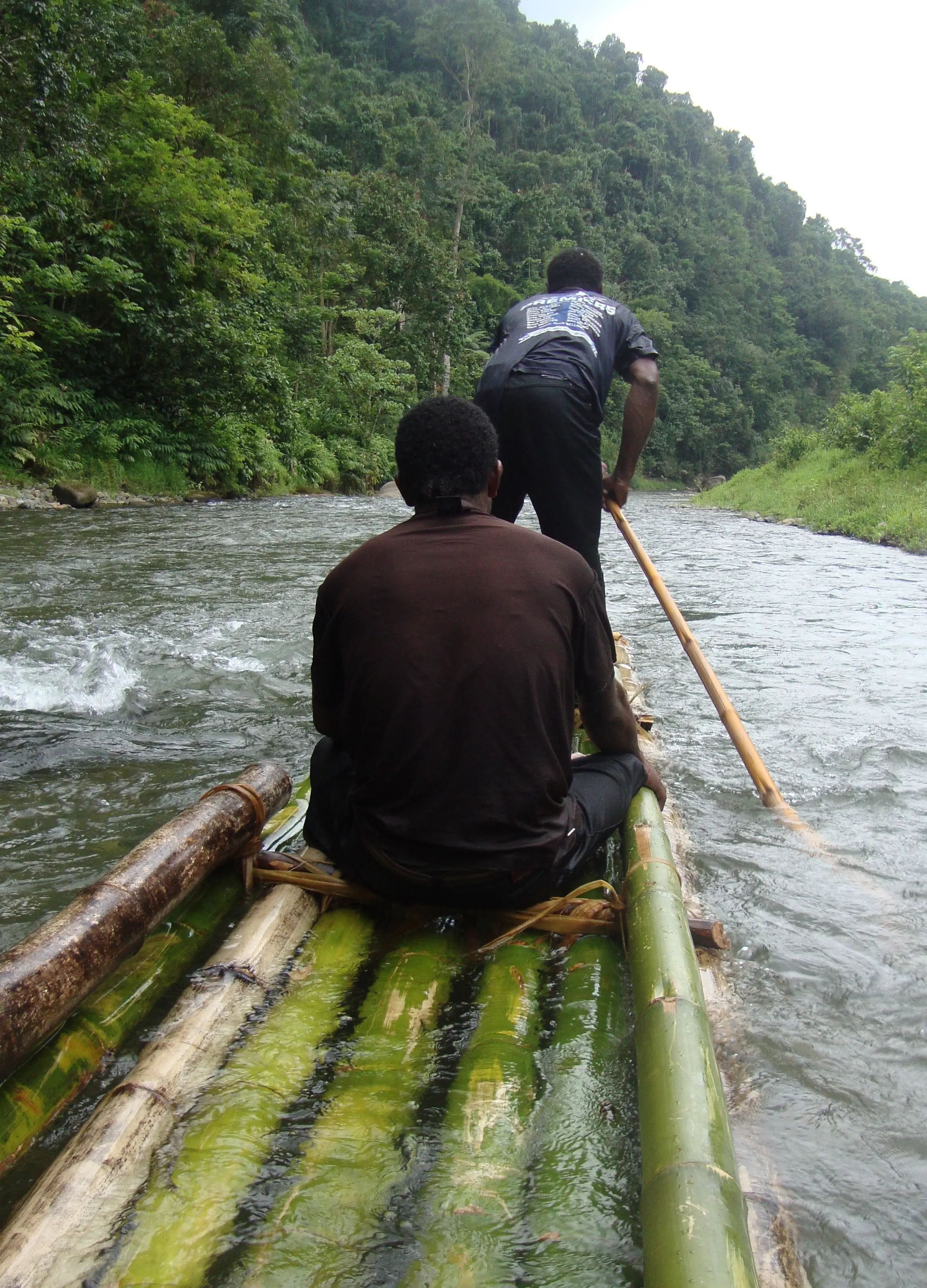 Bamboo rafting down the Waiqa River, Naitasiri, Fiji.
