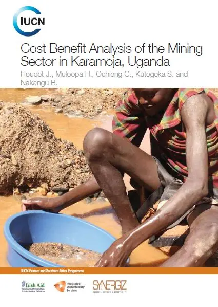 Gold artisanal and small scale miner along a river bed. Plastic basins are commonly
used for gold separation.