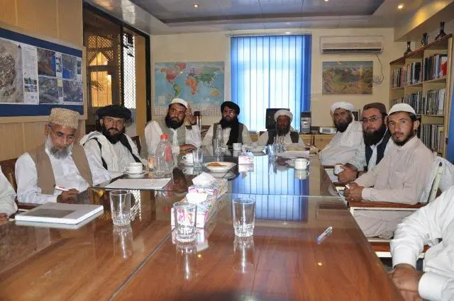 Religious scholars during a presentation on climate change