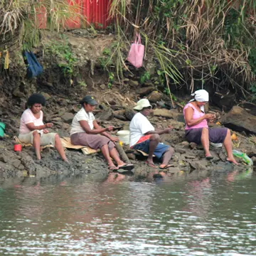 Women fishing near mangrove area in Lami, Fiji.